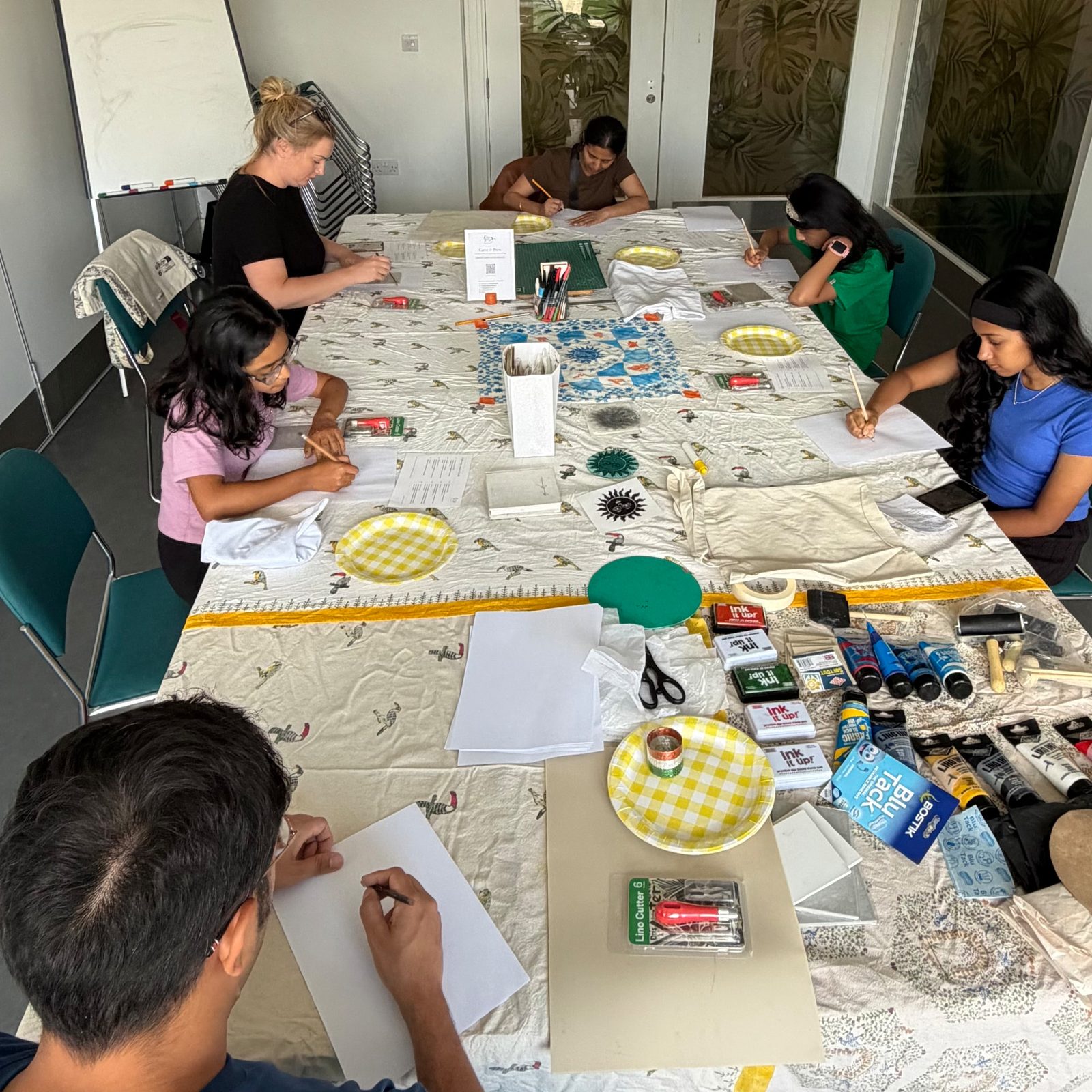 A group taking part in a Mayadori lino printing workshop